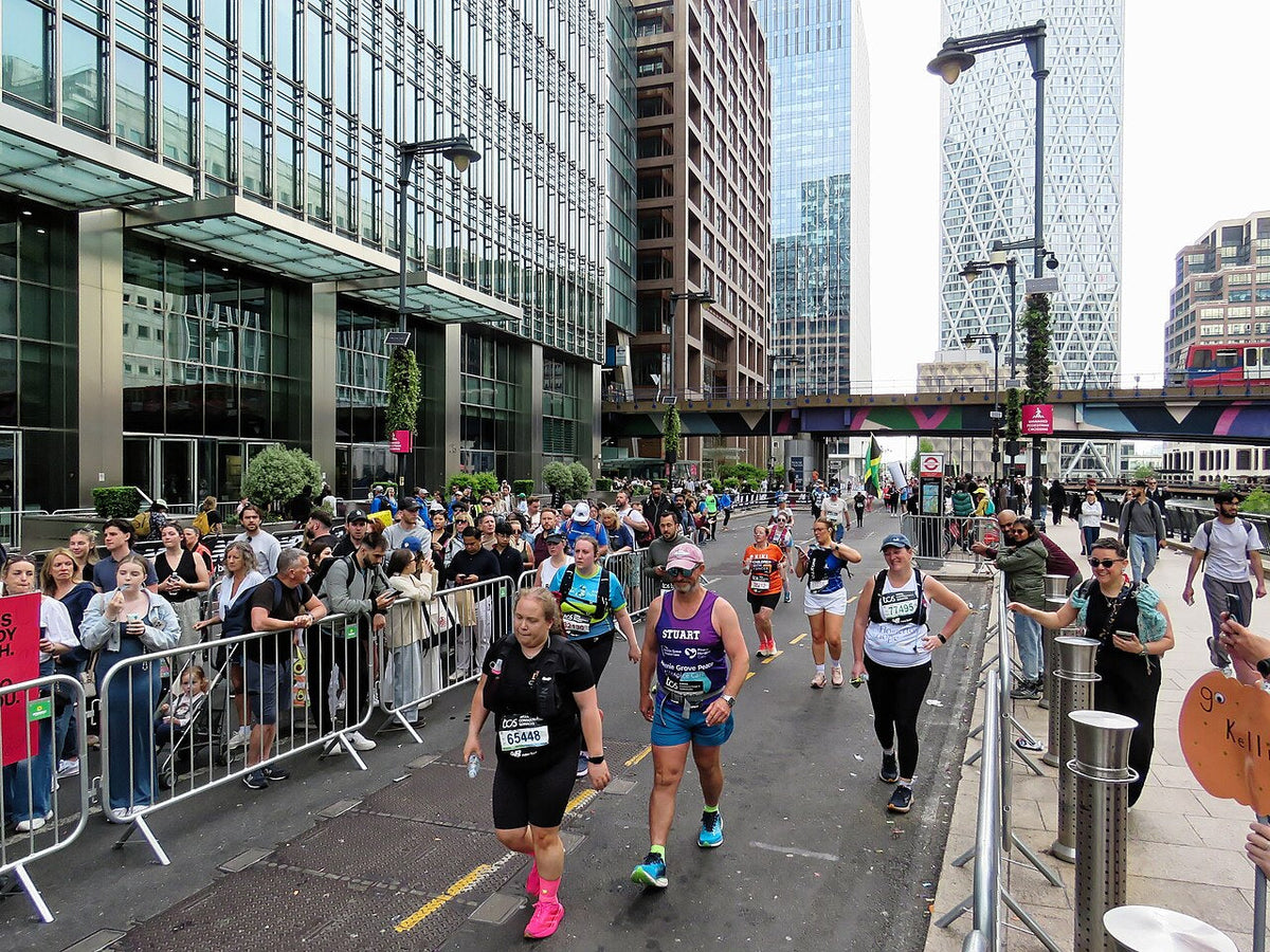 London Marathon participants and spectators at Canary Wharf in 2026.