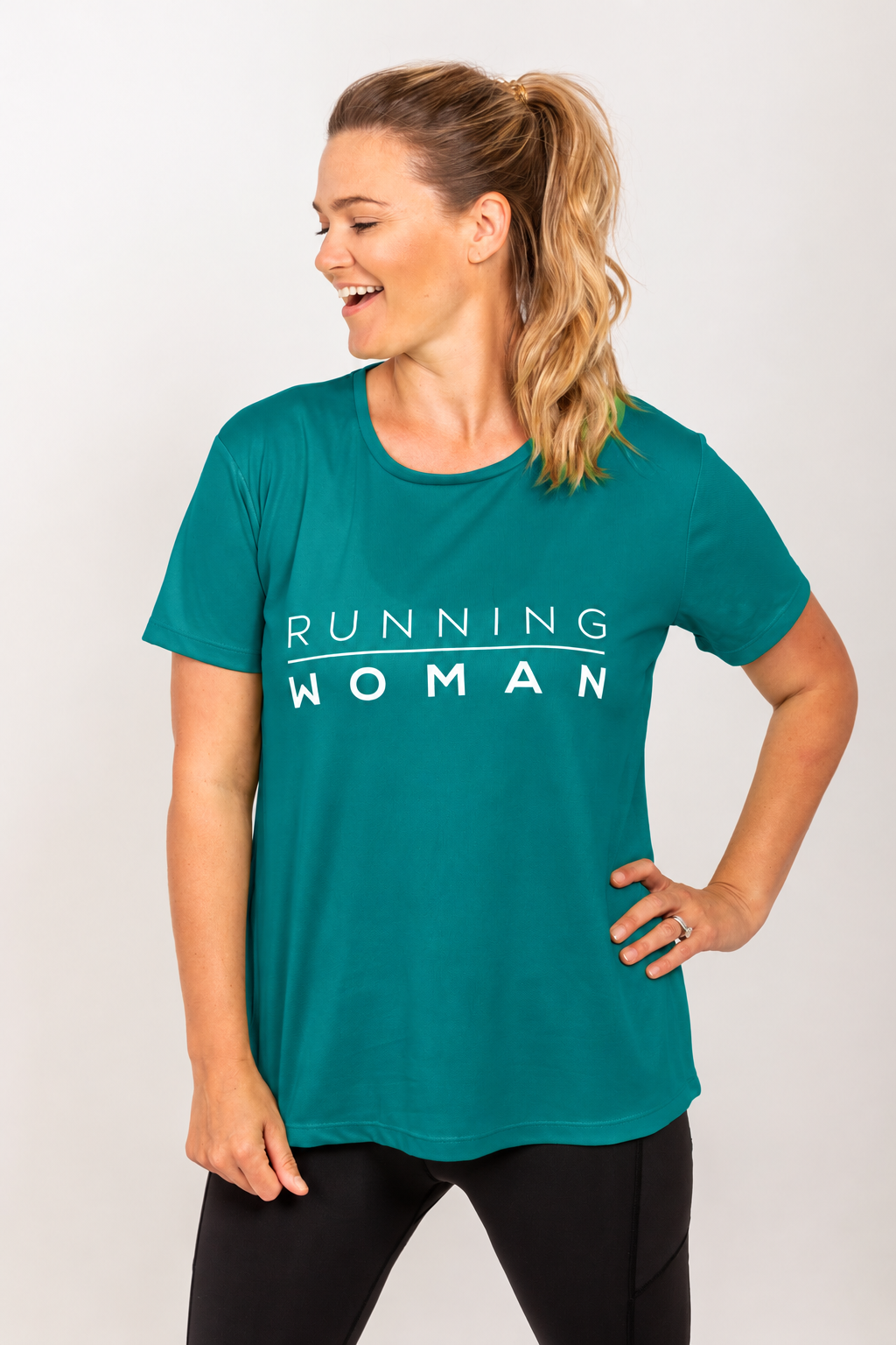 Jade Running Woman running T-shirt on a model laughing with one hand on her hip