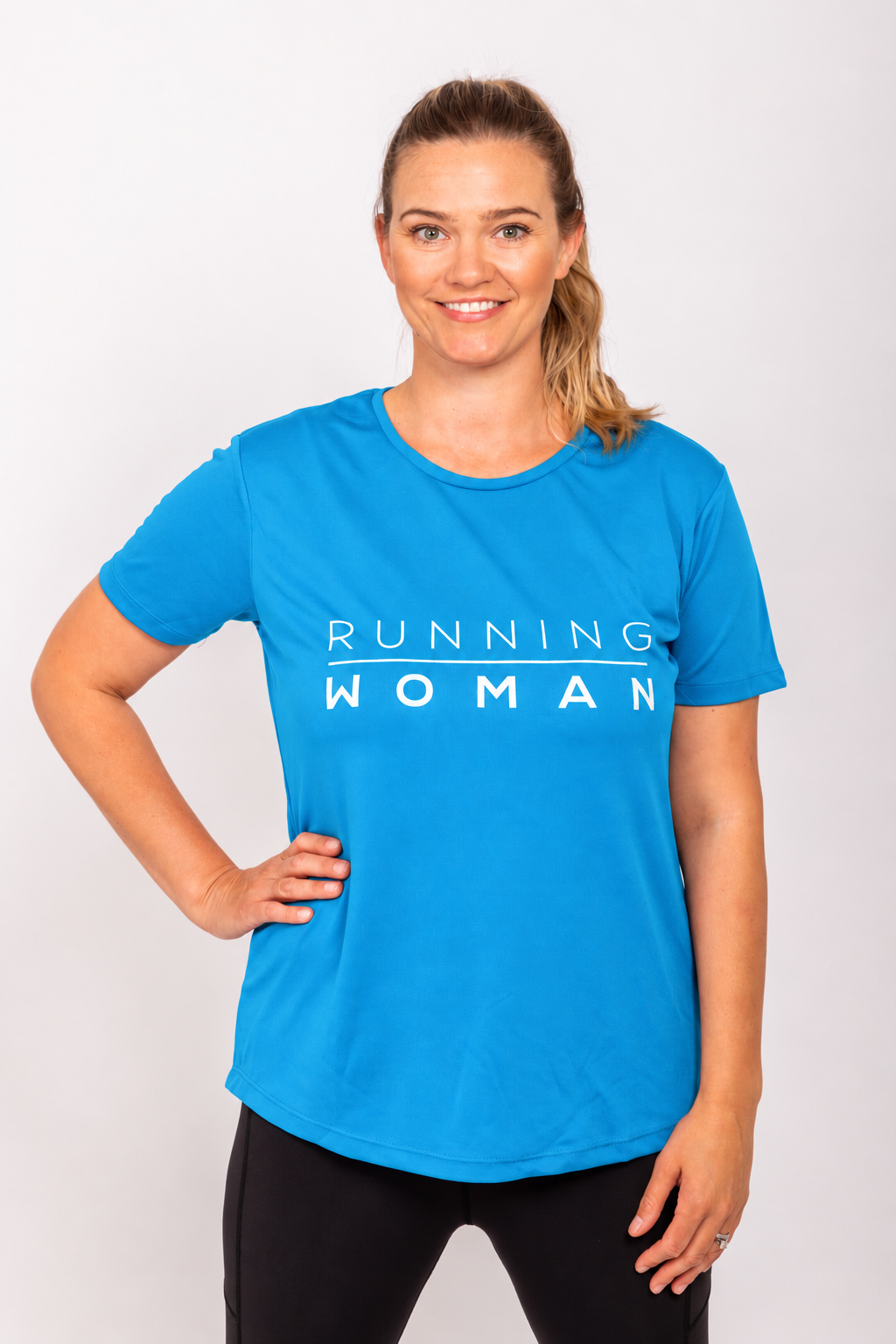 Sapphire blue Running Woman running T-shirt on a model with one hand on her hip