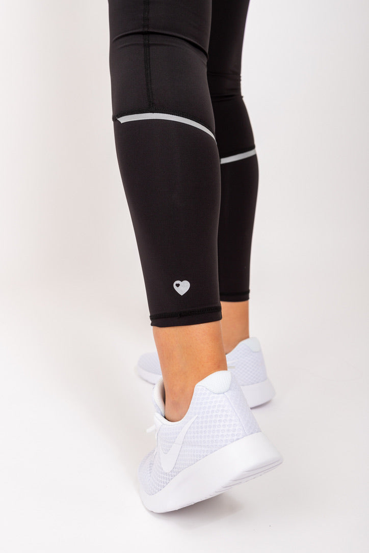 Exclusive black Running Woman Resilience leggings