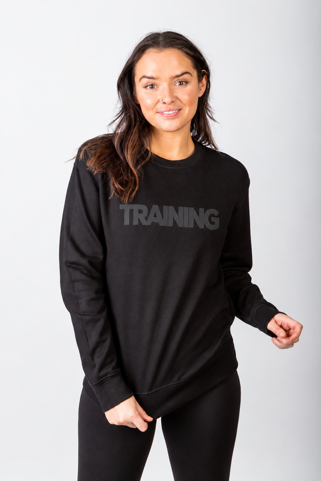 Black Run Club TRAINING sweatshirt on a brunette model, relaxed front view