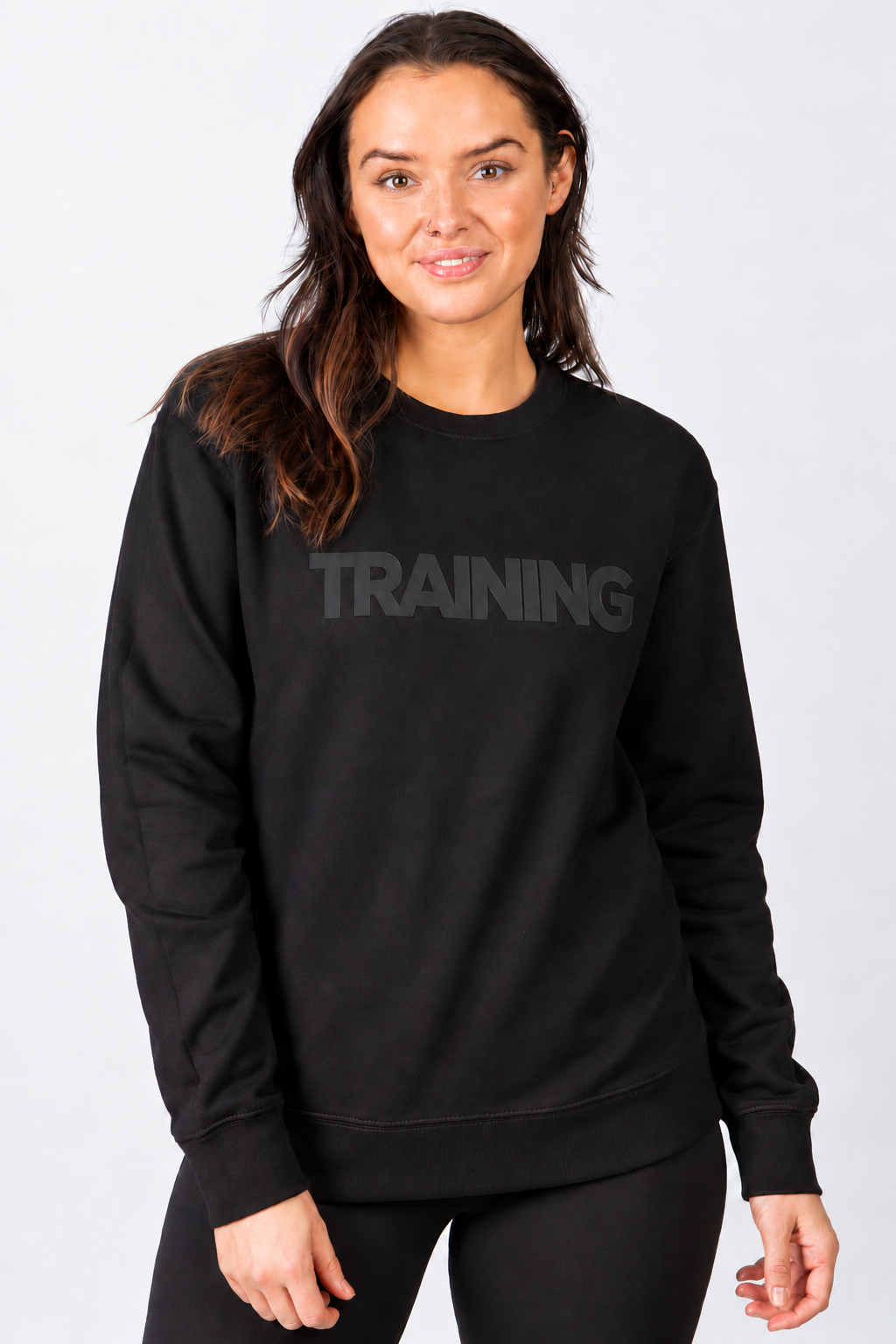 Closer front view of the black Run Club sweatshirt with tonal TRAINING vinyl lettering