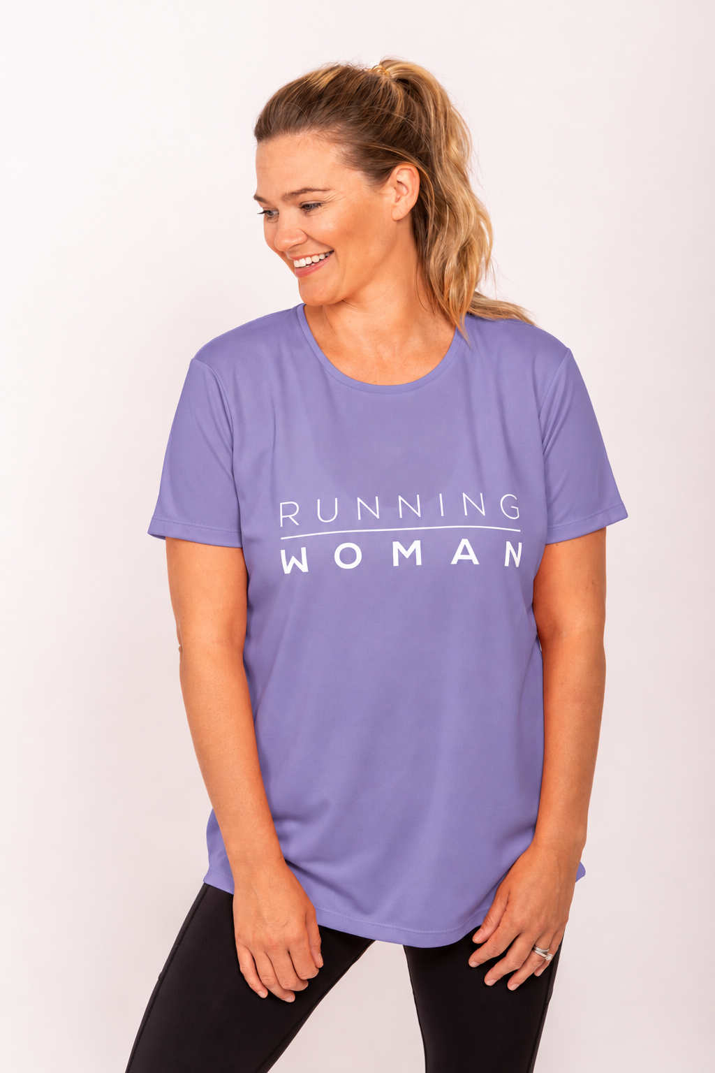 Model wearing the lavender Running Woman running T-shirt looking to one side