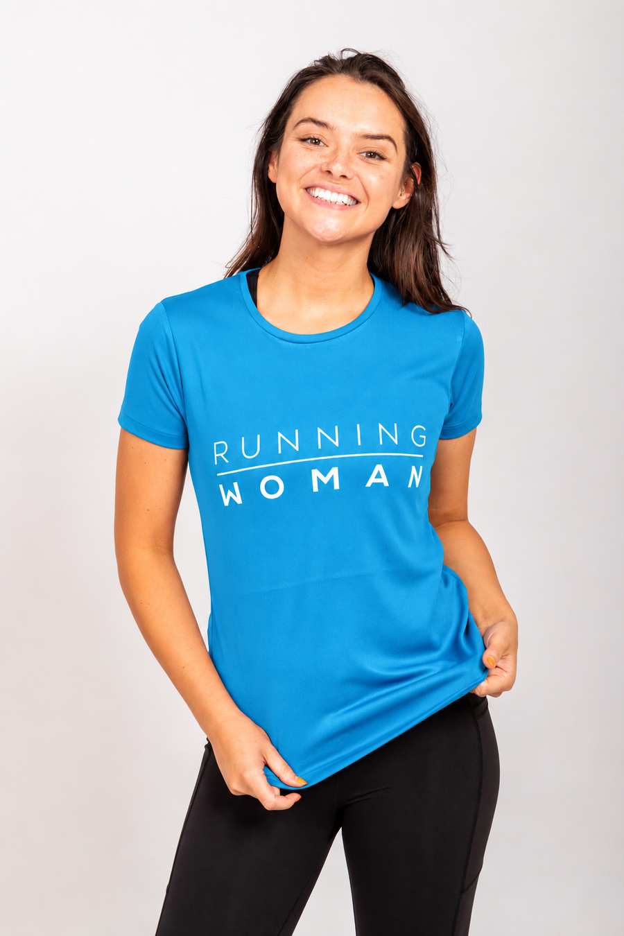 Sapphire blue Running Woman running T-shirt, front view on a smiling model